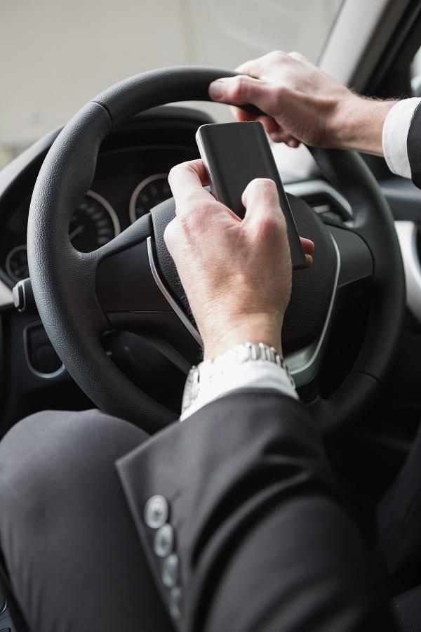DUI-E - States Crack Down on Using Electronics While Driving
